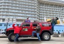 Photo of guests on red hummer